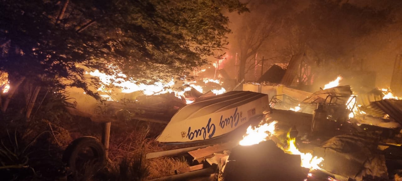 Wildfires Ravage Western Cape: Fishing Club Members Evacuated Amidst Devastation